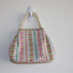 White multi color mirror with pearl handle small hand bag